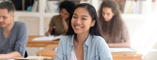 Smiling Asian student classroom 600x230